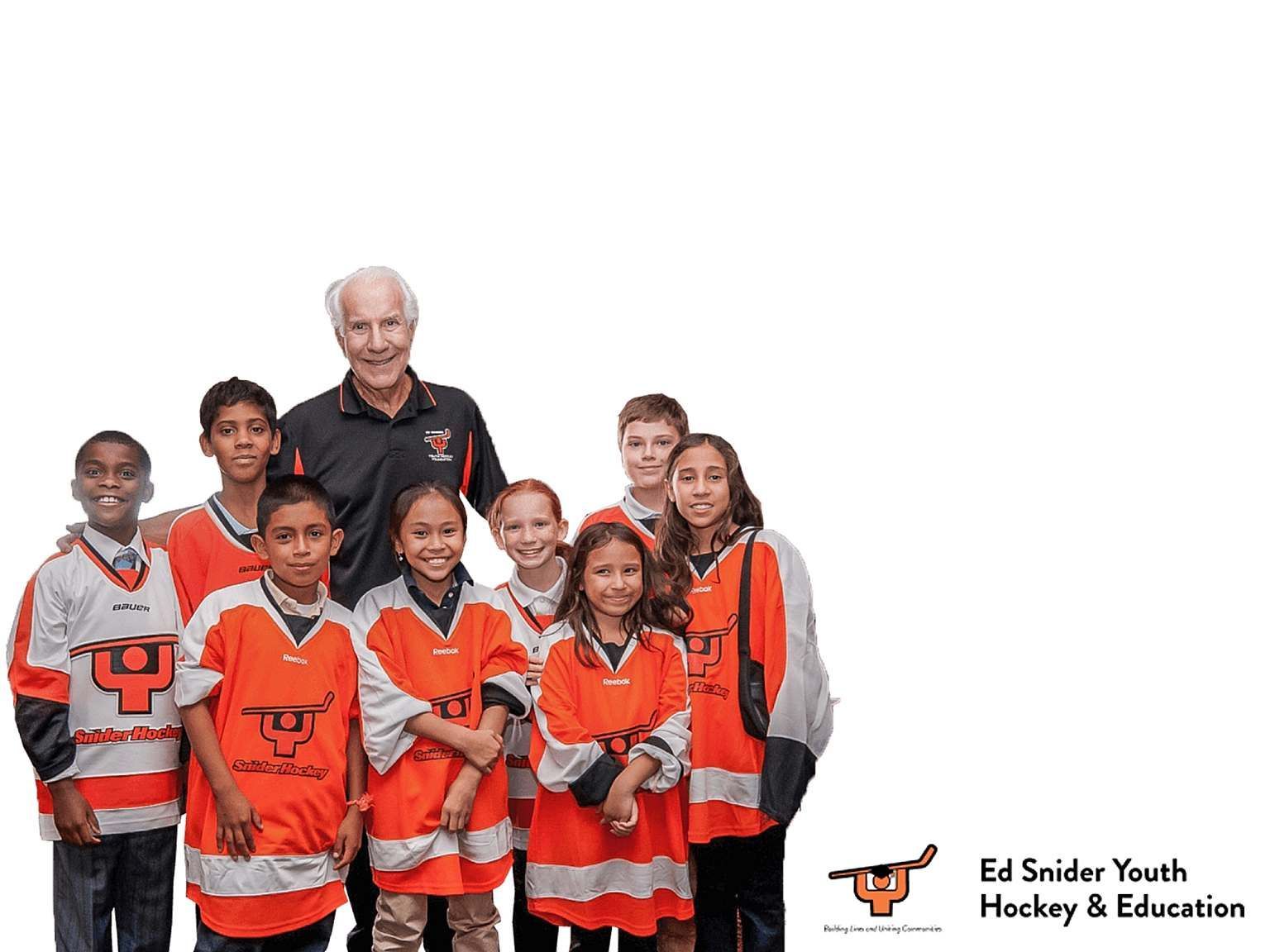 Youth hockey team in orange jerseys posing with a coach on a white background