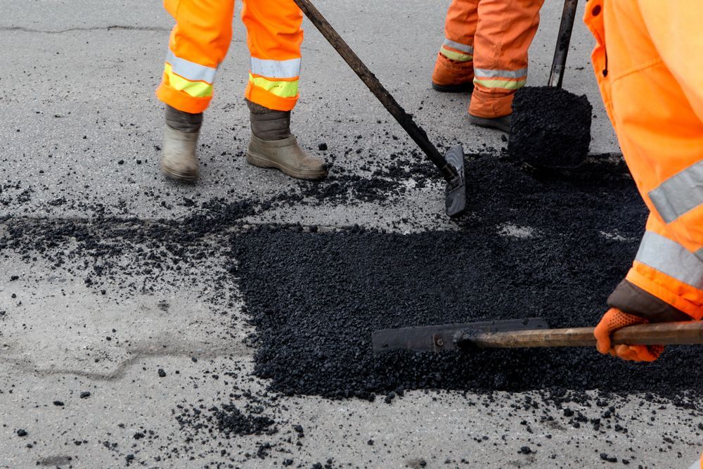 Adding Asphalt— North Coast Asphalts in Corindi Beach, NSW Adding Asphalt — North Coast Asphalts in Corindi Beach, NSW
