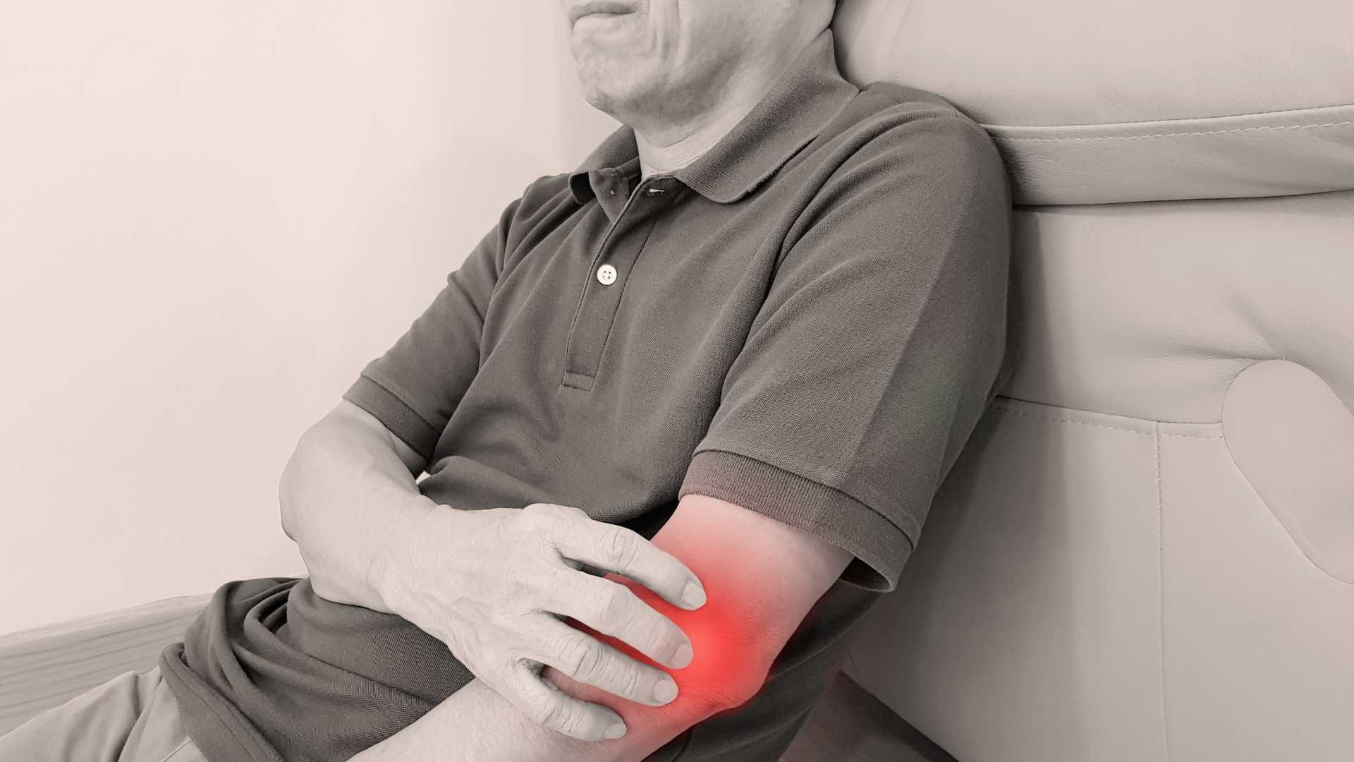 Hands placing acupuncture needles on a person’s back and neck in a spa treatment setting