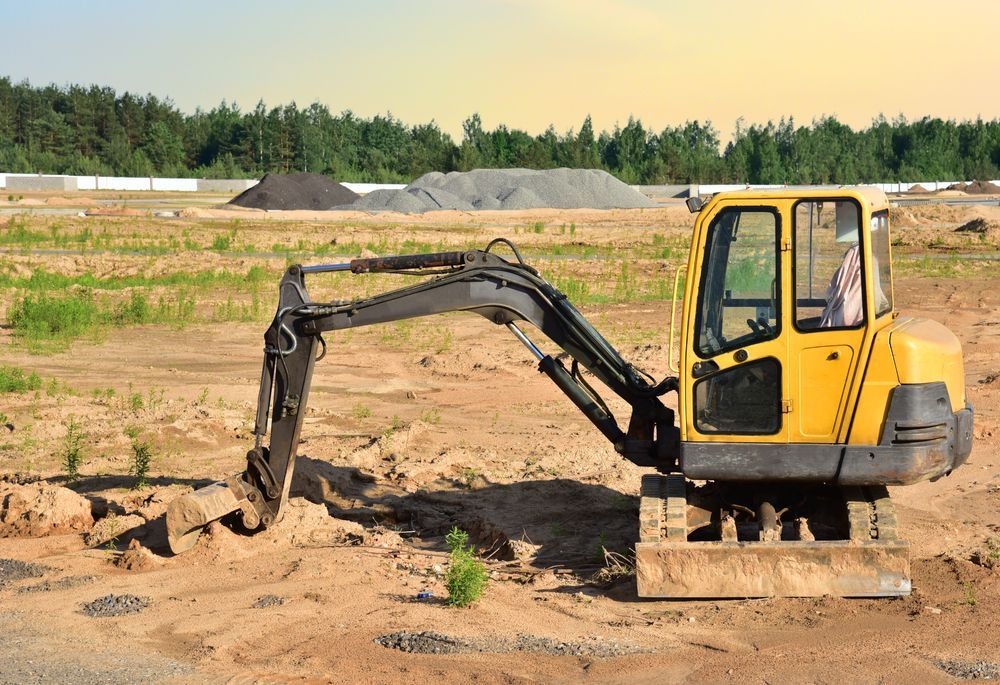 Yellow Excavator on a Construction Site — B&T Earthworks & Civil in Yorkeys Knob, QLD