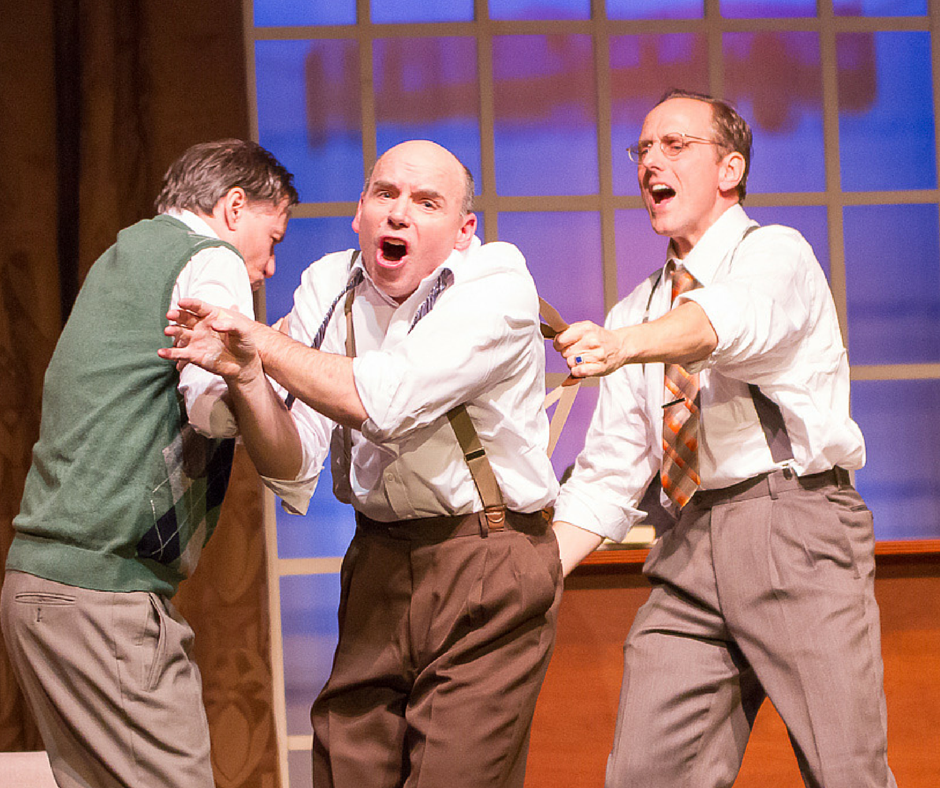Three male actors on stage