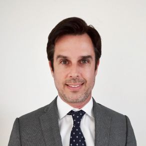 A professional headshot of Jean Josse.