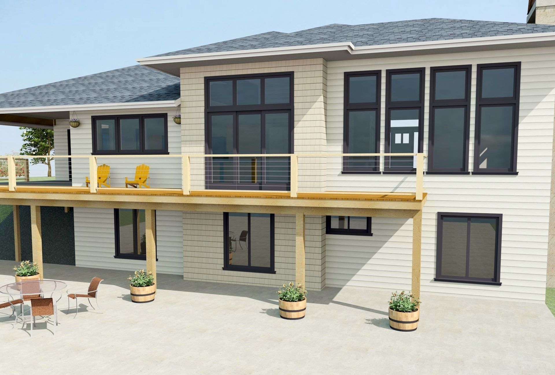 Modern two-story house with cream walls, dark windows, balcony, and a patio with outdoor furniture