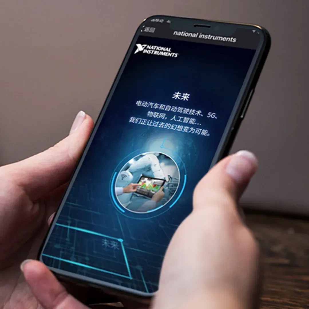 A person is holding a cell phone with a robot on the screen.