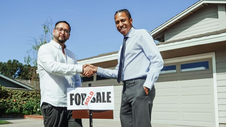 Grand Rapids commercial real estate closed deal - Baragar Realty client handshake