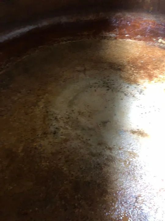 A Close Up Of A Rusty Water Tank — Alligator Water Tank Cleaning In Pomona, QLD