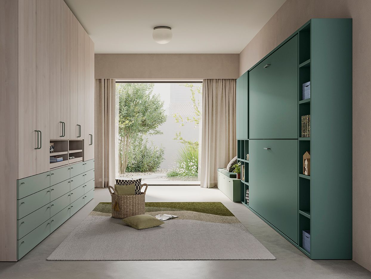 Uno spazio di archiviazione moderno con armadietti verde chiaro, una grande finestra e un tappeto neutro.