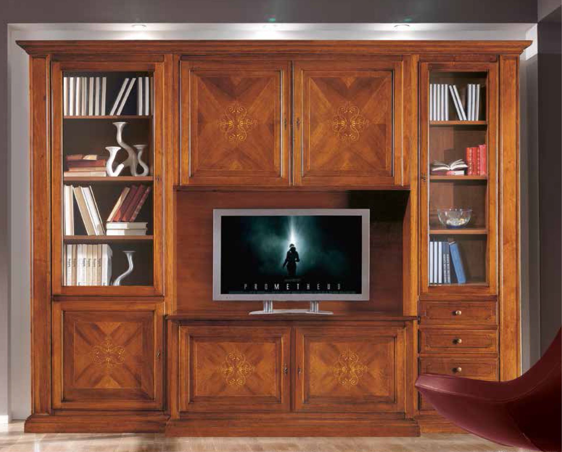 Mobiletto porta TV in legno con libreria e armadietti portaoggetti.