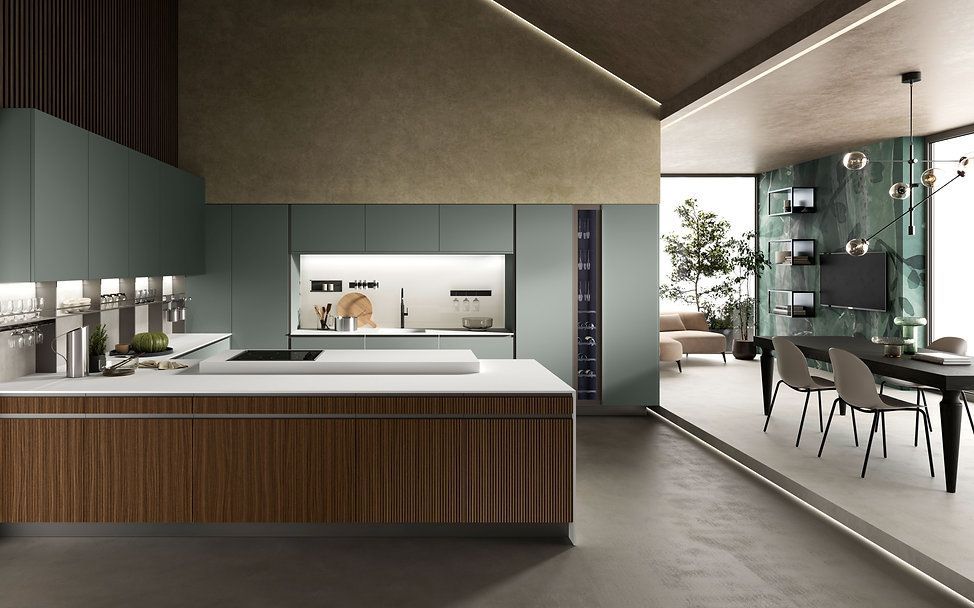 Cucina moderna con mobili color verde acqua, isola in legno, portabottiglie e zona pranzo.
