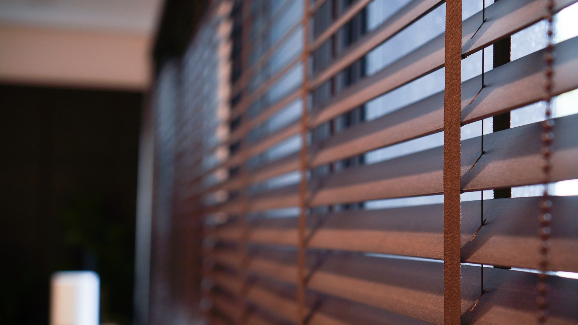 A set of real wood blinds in a residential home