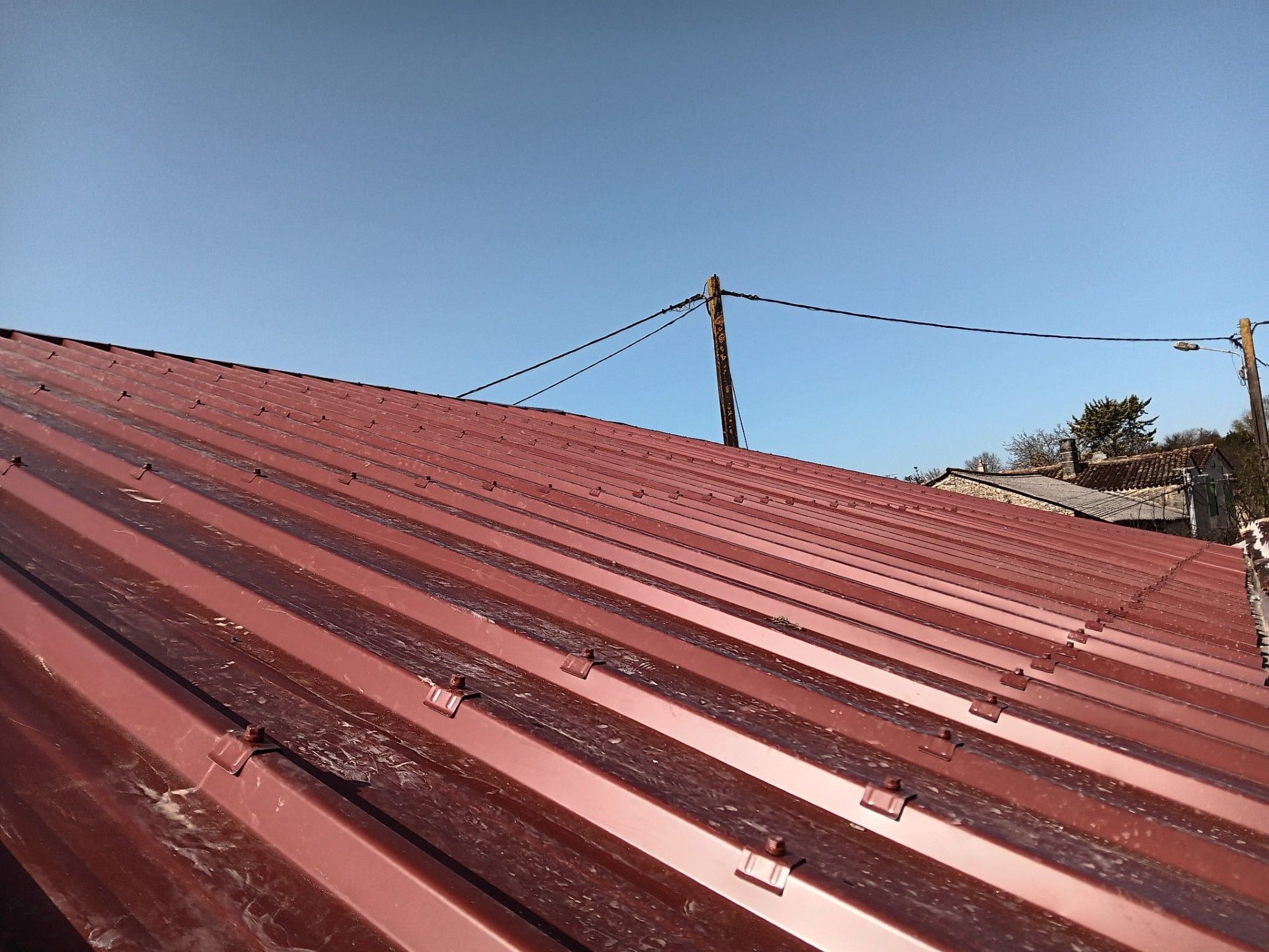Installation d'une couverture en bac acier