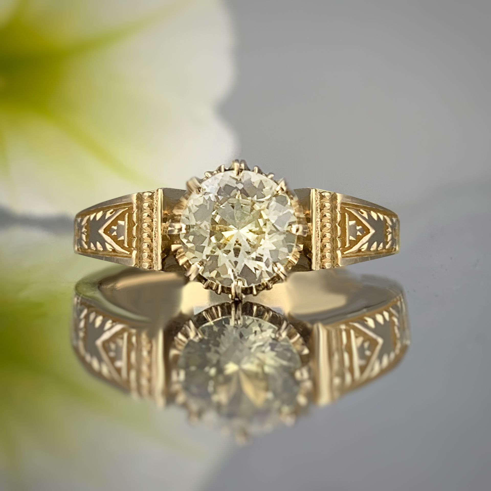 A gold ring with a diamond in the center