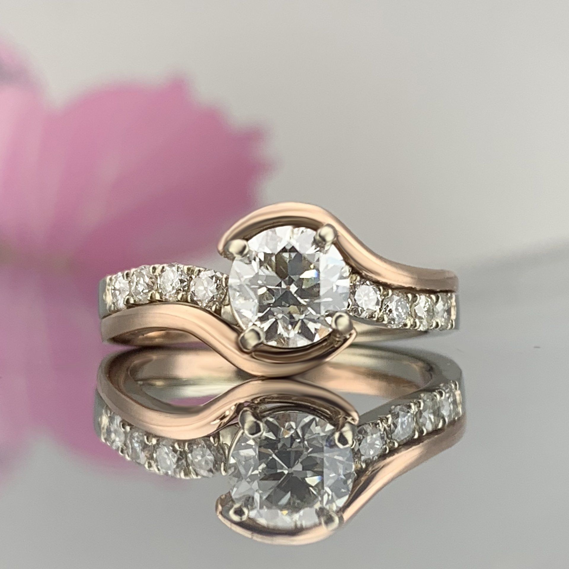 A close up of a ring with a diamond in it
