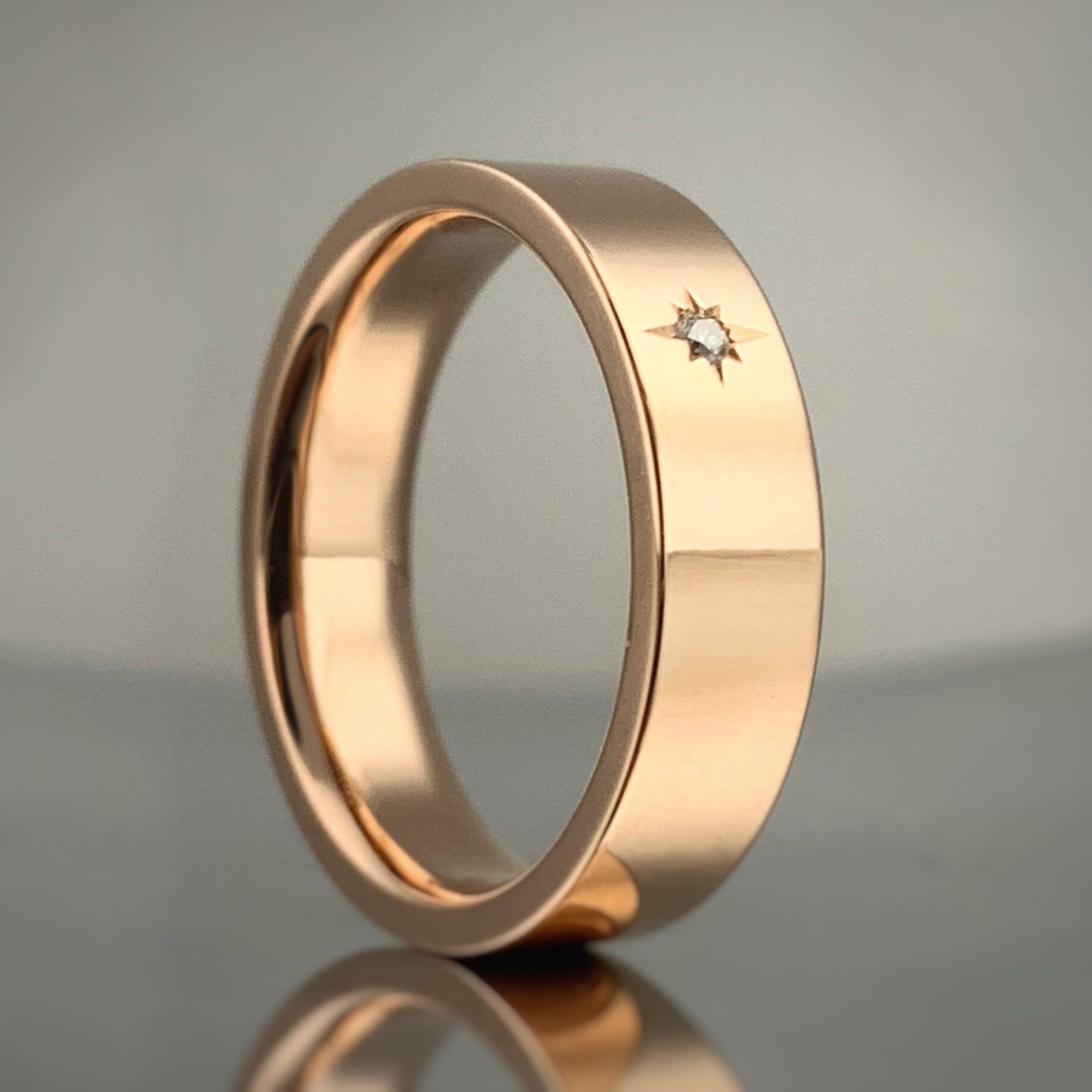A gold ring with a diamond in the center