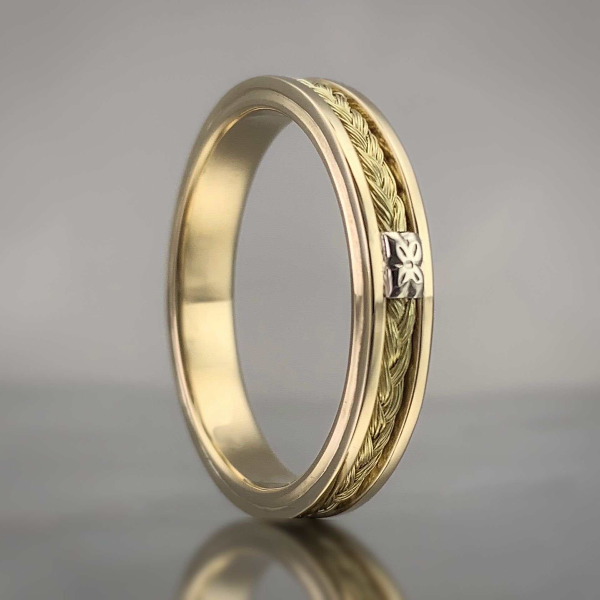 A gold ring with a diamond in the center