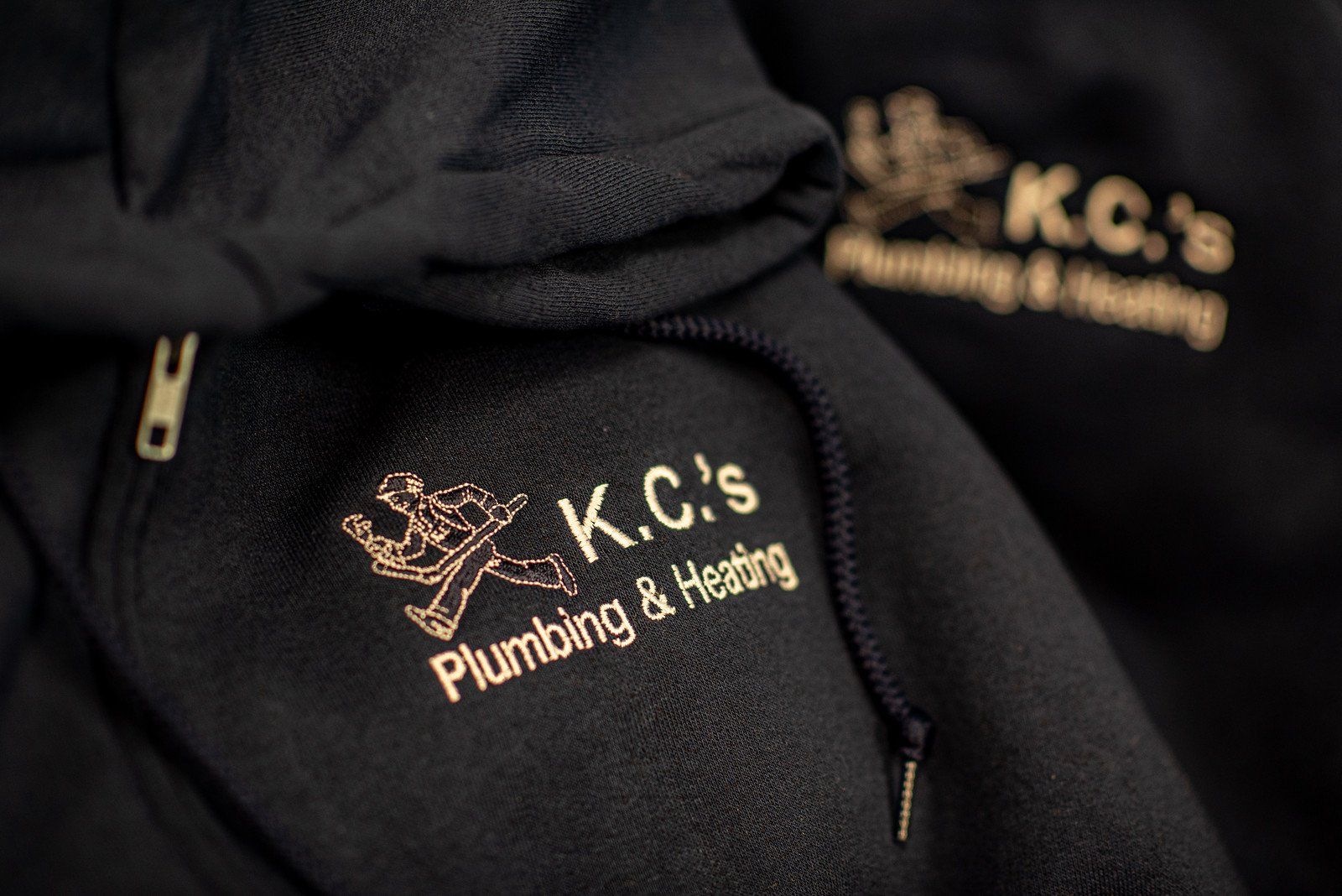 Black hoodies embroidered with gold 