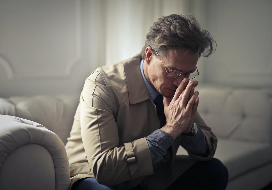 Sideview of upset man