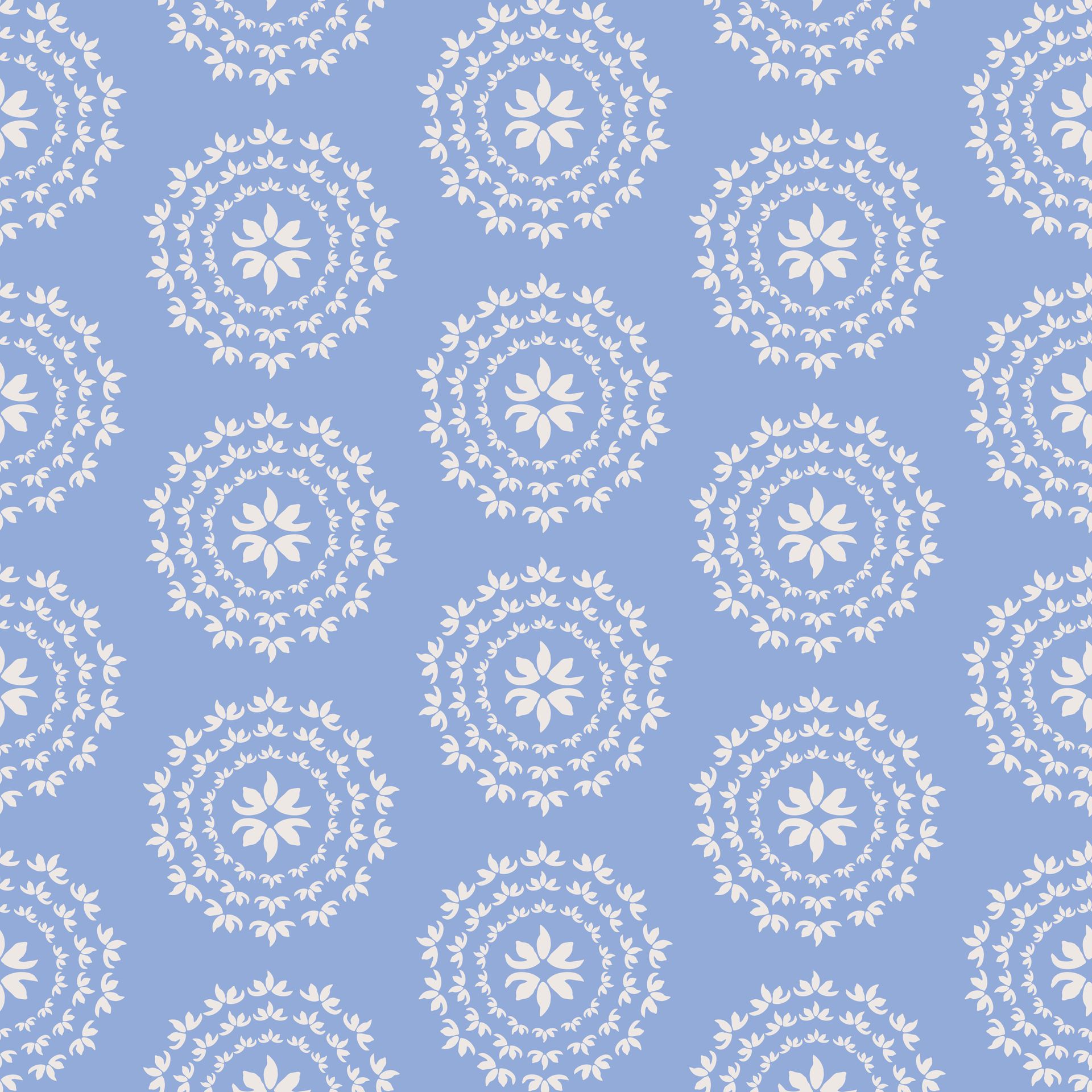 It is a seamless pattern with white leaves in circles on a blue background.