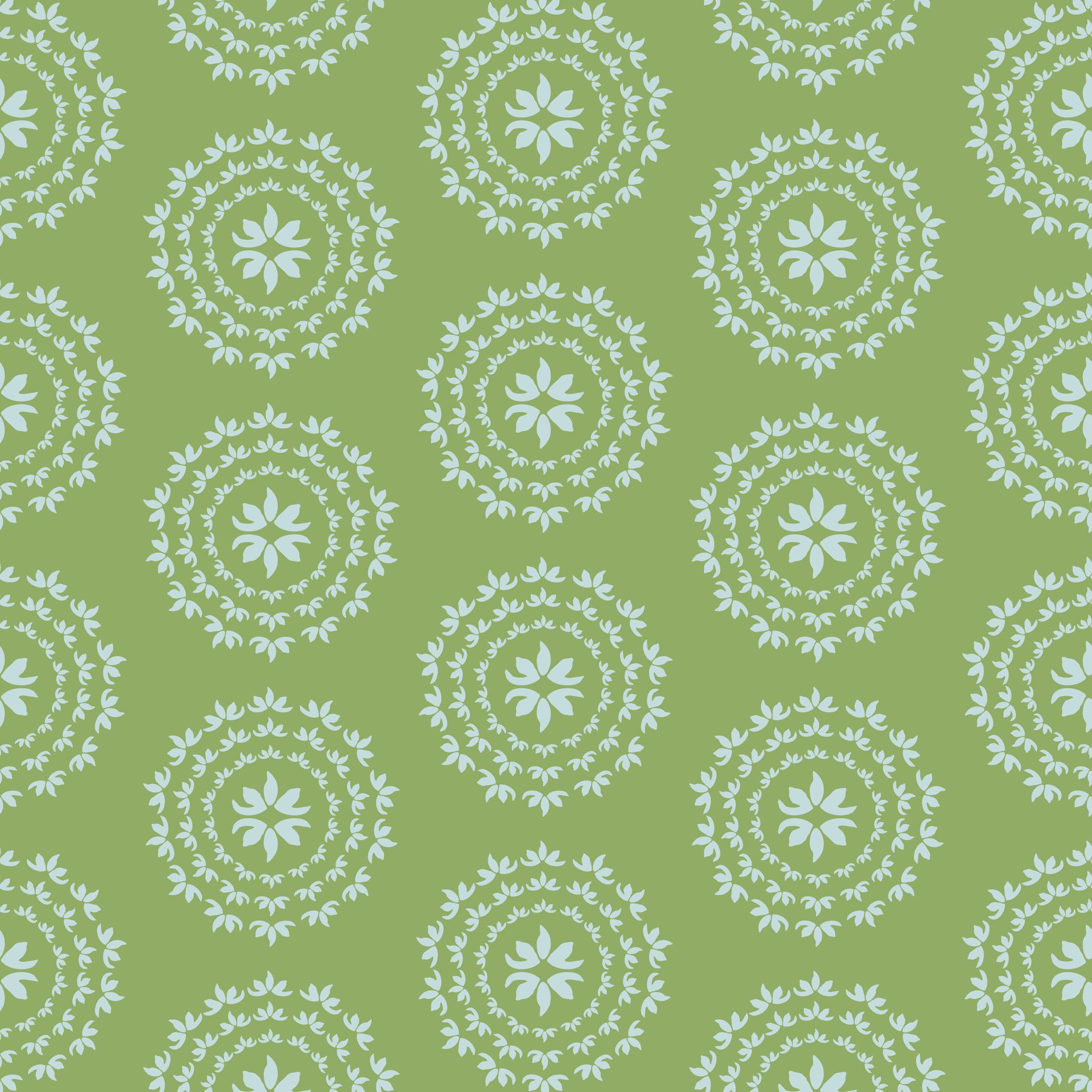 A seamless pattern with white leaves in circles on a green background.