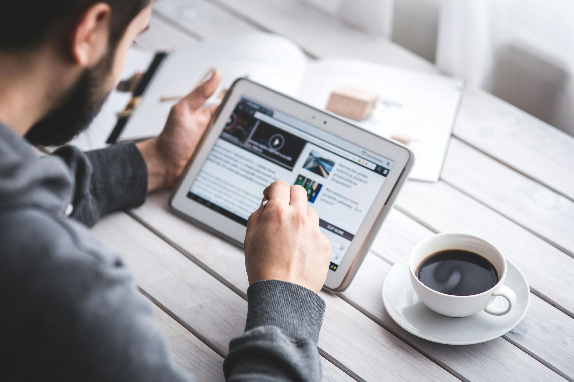man using an ipad