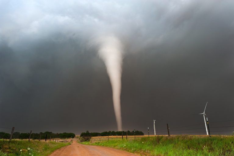 An active tornado on a flat field | Protect your family with residential storm shelters