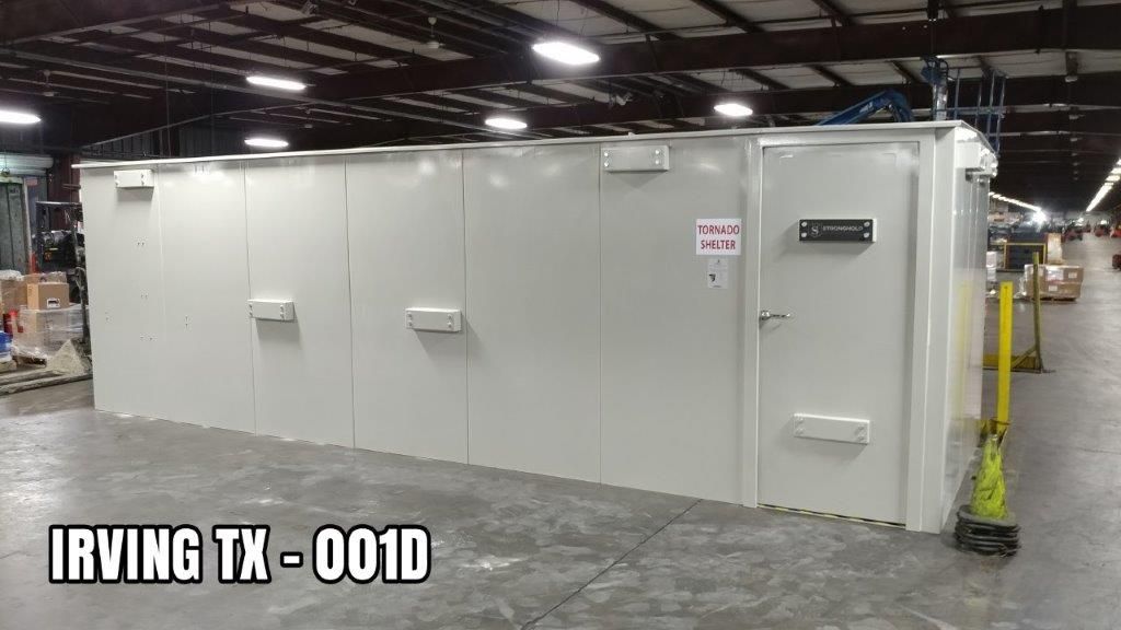 above ground storm shelter done inside commercial warehouse in irving tx