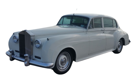 A white rolls royce on a white background.