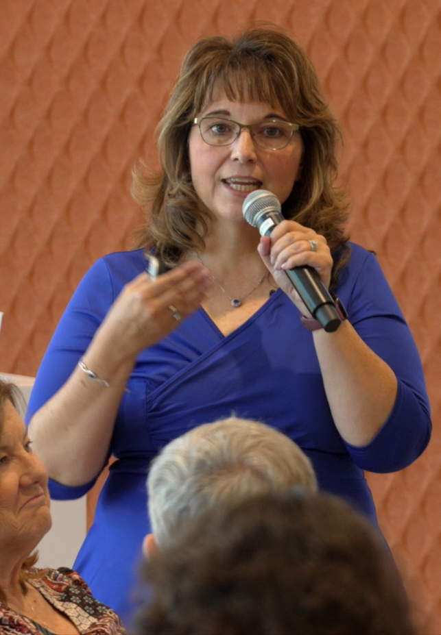 Founder Kathi Miracle Speaking to Care providers