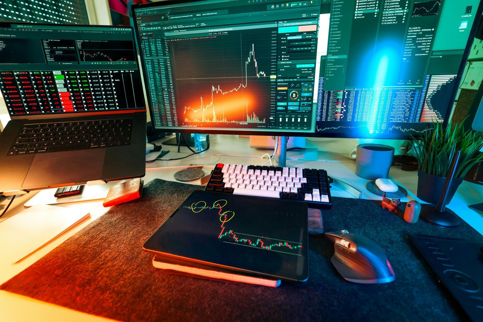A computer desk with two monitors and a keyboard