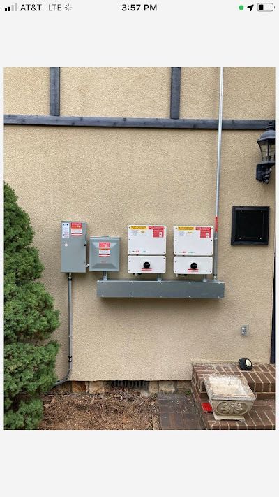 A picture of a wall with a bunch of electrical boxes on it