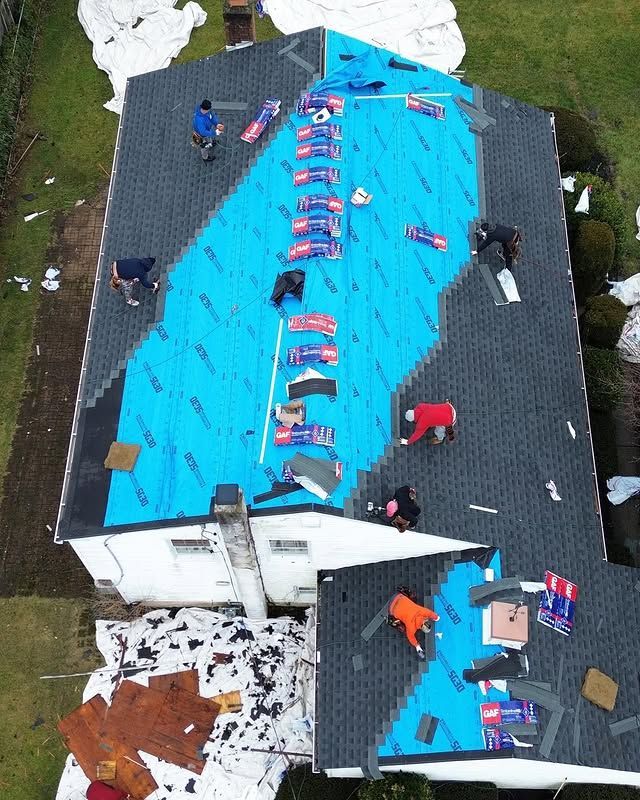 An aerial view of a roof being worked on