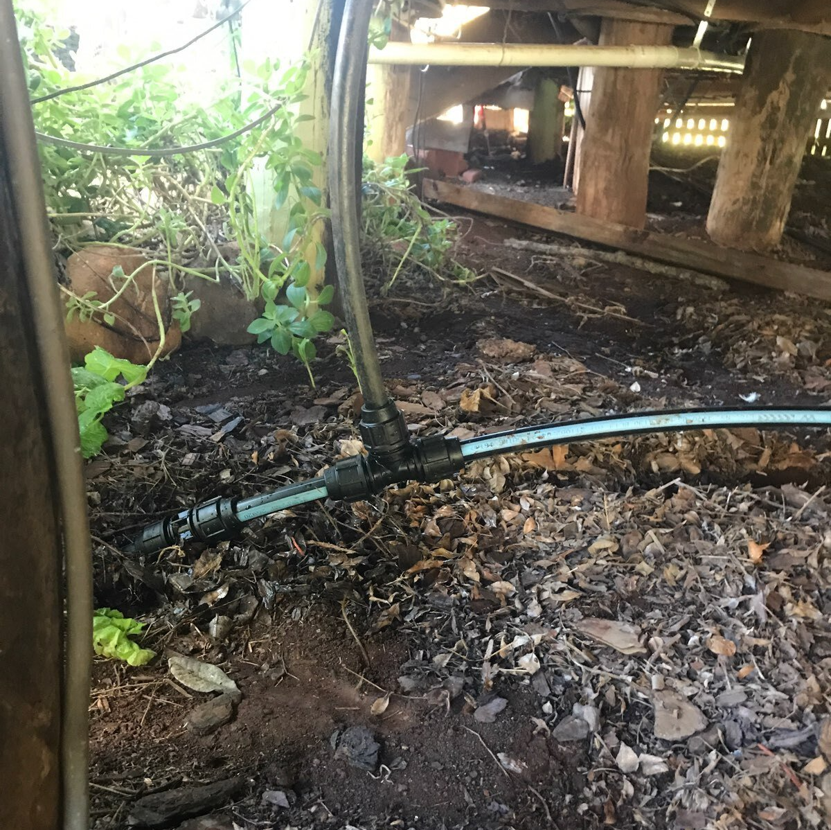New pipe and joiner to repair the leak that had been in the pipe causing the hissing sound.