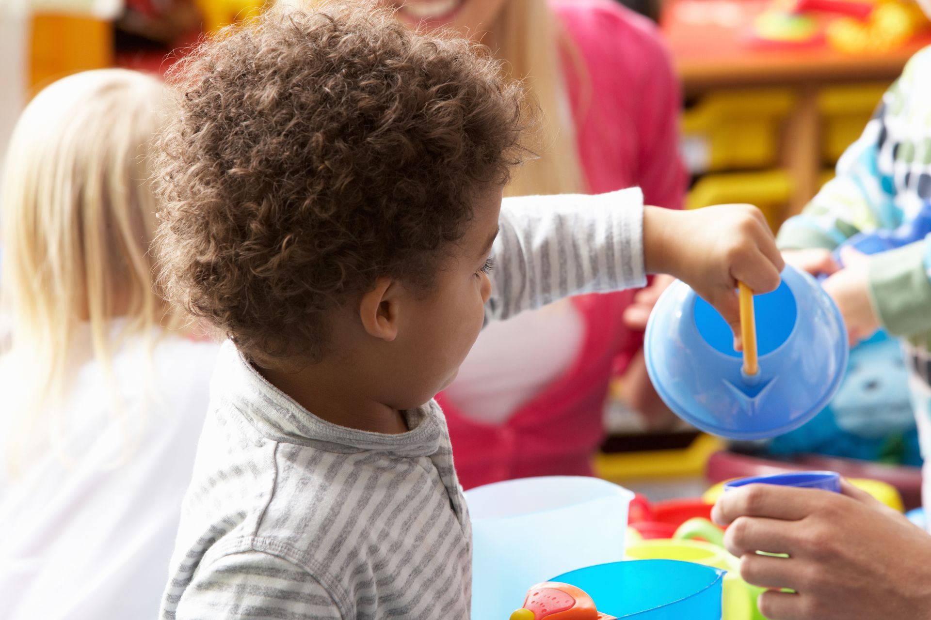Children in kindergarten enjoying hands-on learning at Creative Montessori Learning Center’s prescho