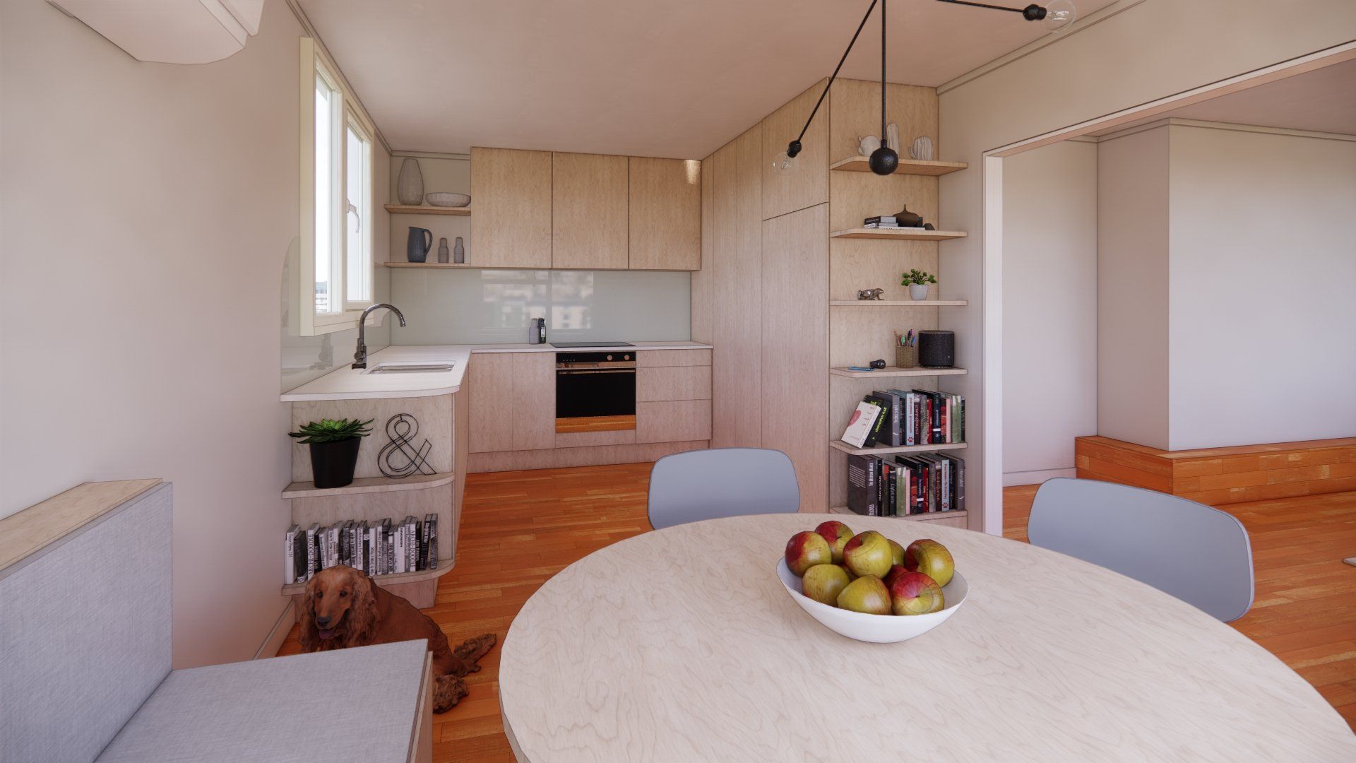 There is a bowl of apples on the table in the kitchen.