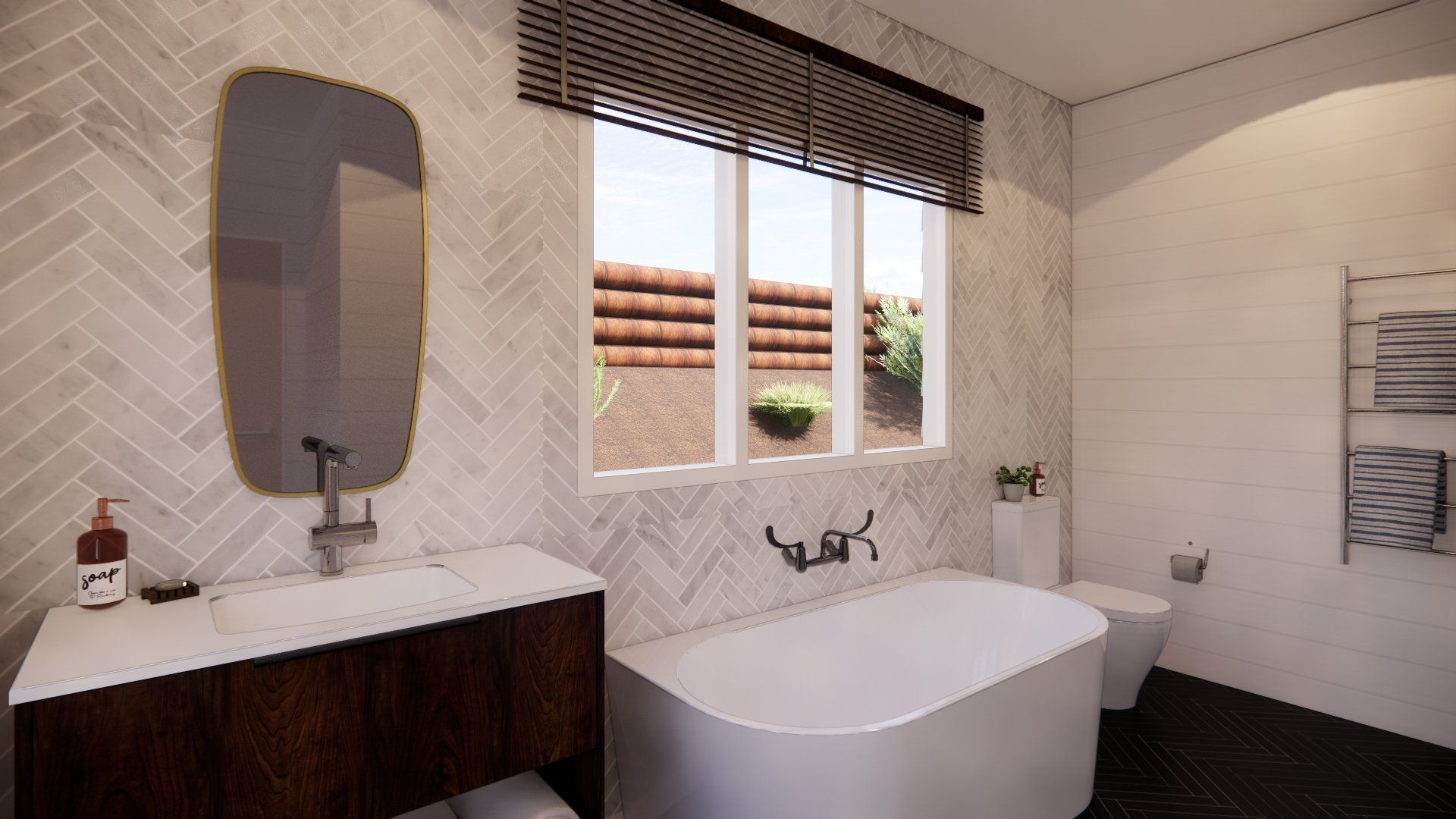 A bathroom with a tub , sink , toilet and mirror.