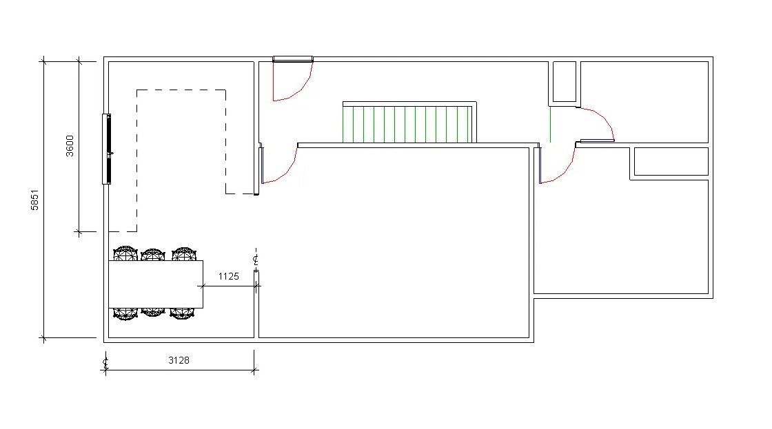 A black and white floor plan of a house with a staircase.