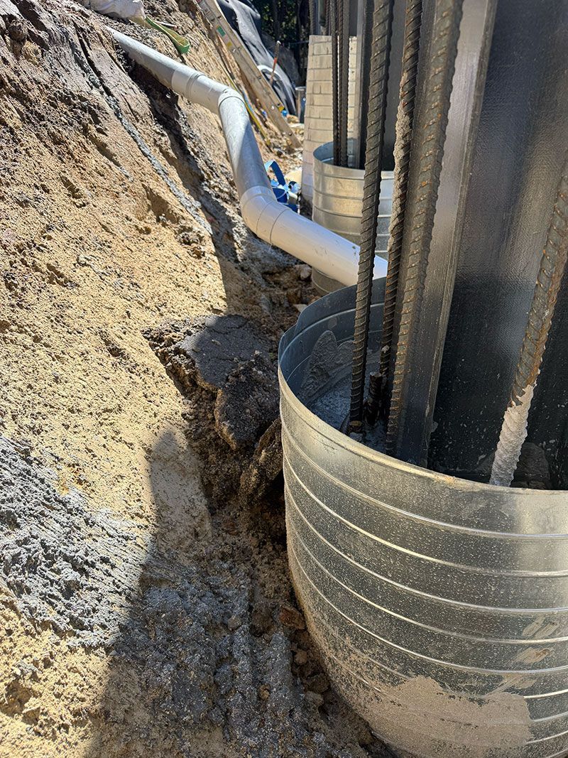 Steel pile liners in unstable ground