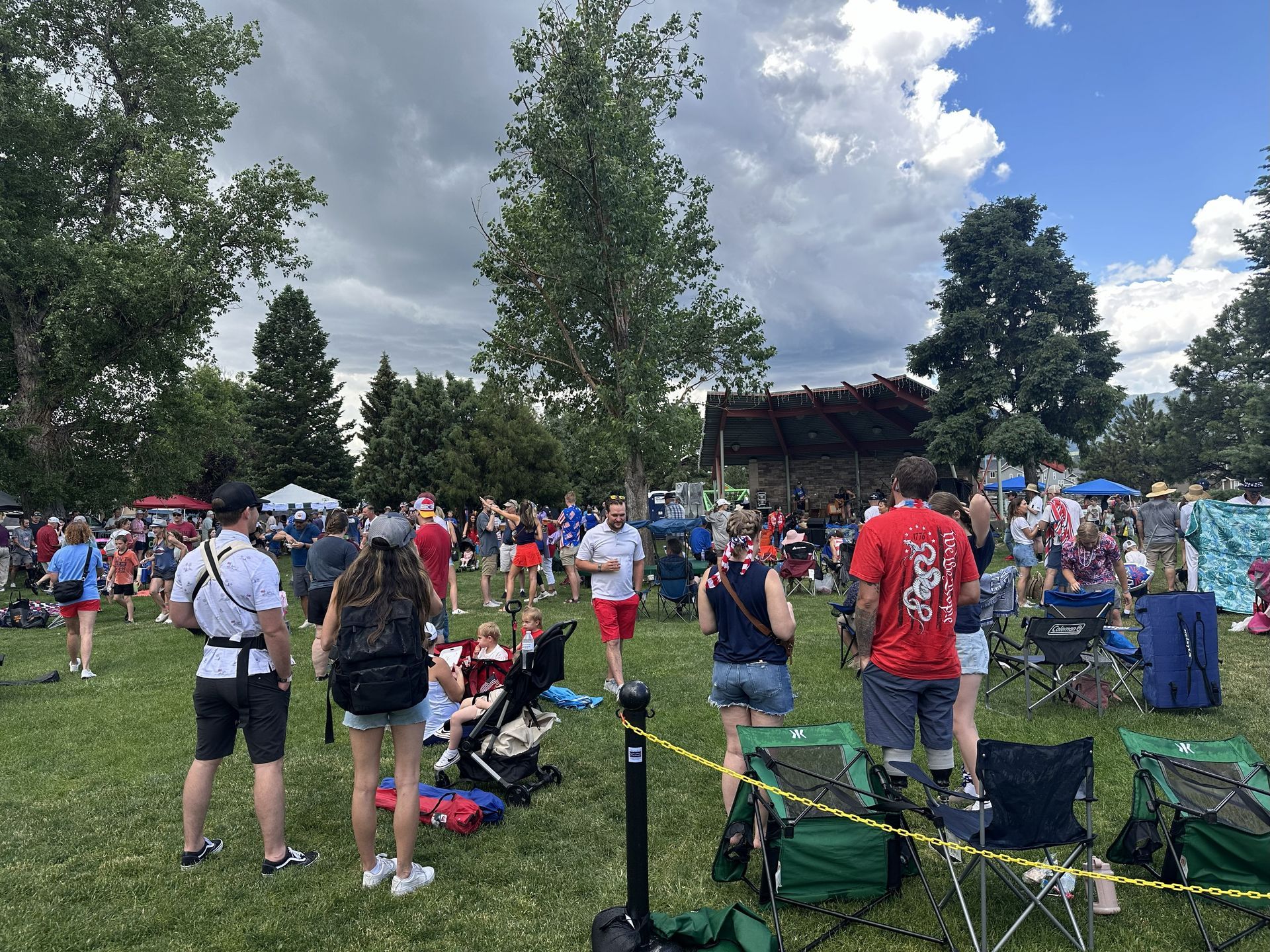 4th of July Beer Garden attendees standing and enjoying Limbach Park in Monument, Colorado