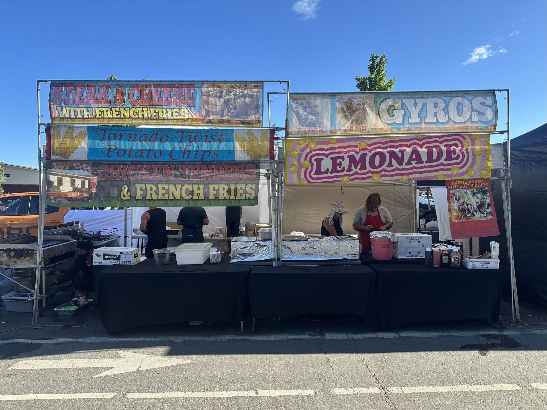 A food stand with a wide variety of fair food
