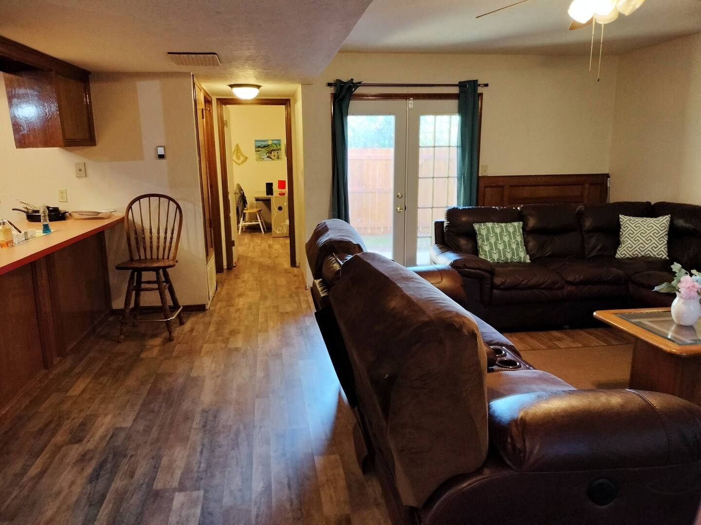 A living room with a couch and a chair