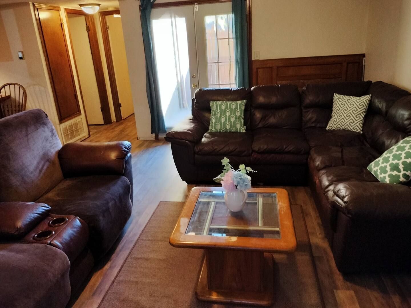 A living room filled with furniture and a coffee table