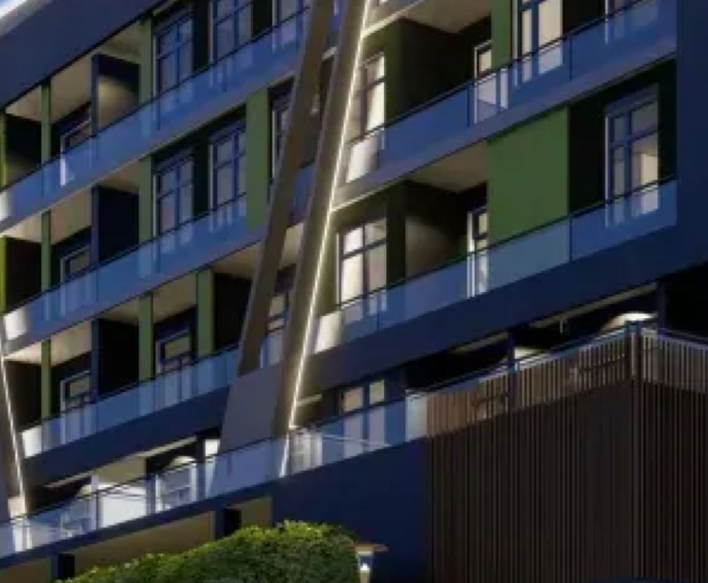 A building with a lot of windows and balconies