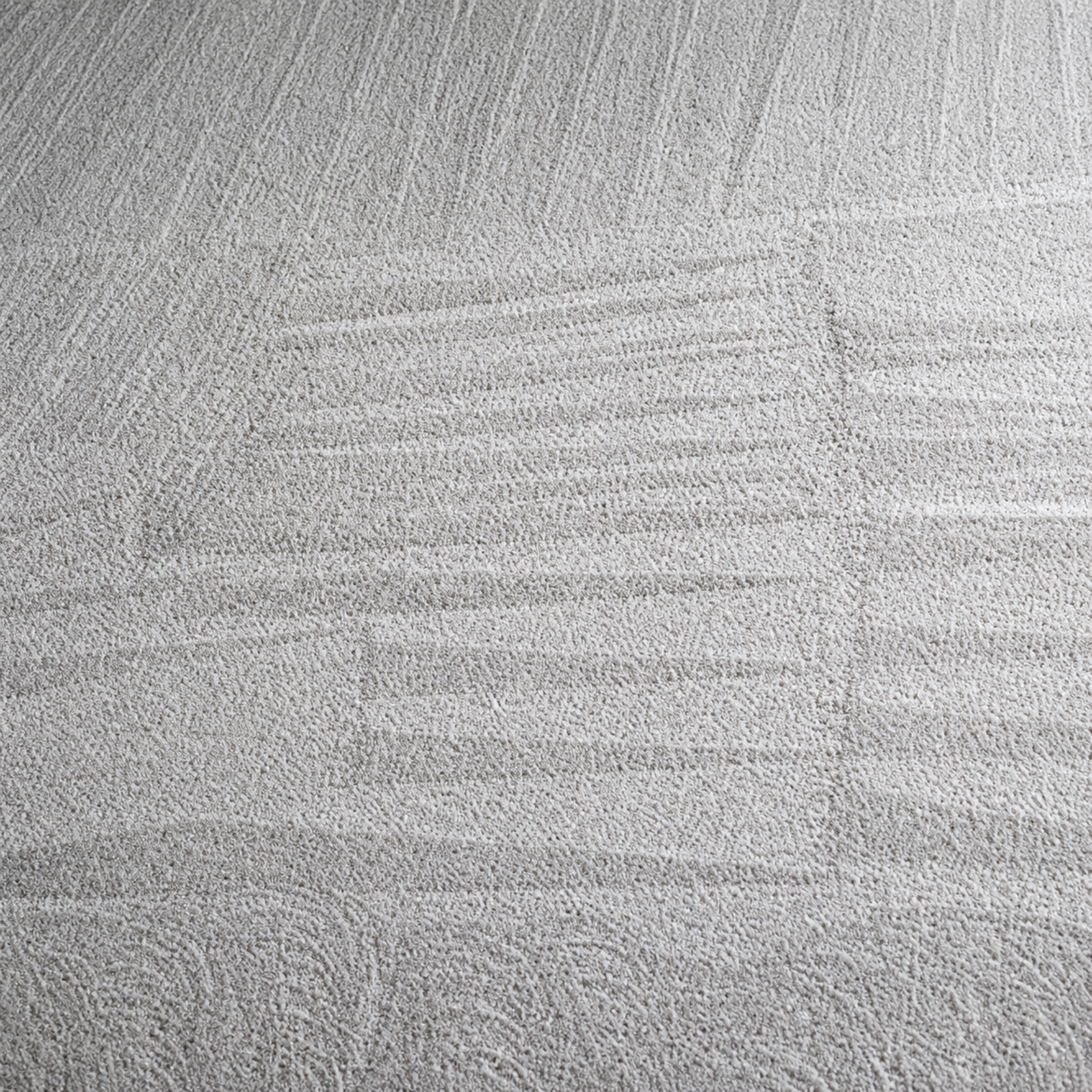 Close-up of light gray fabric with subtle textured weave pattern