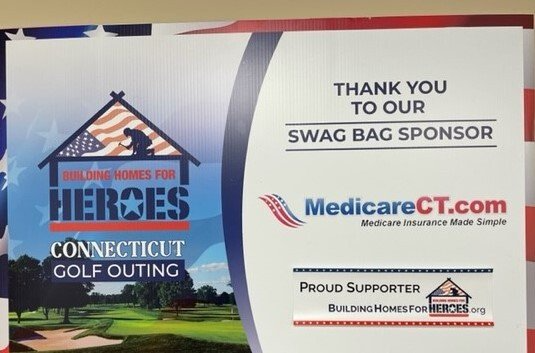 a sign on a wall that says `` thank you to our swag bag sponsor '' .