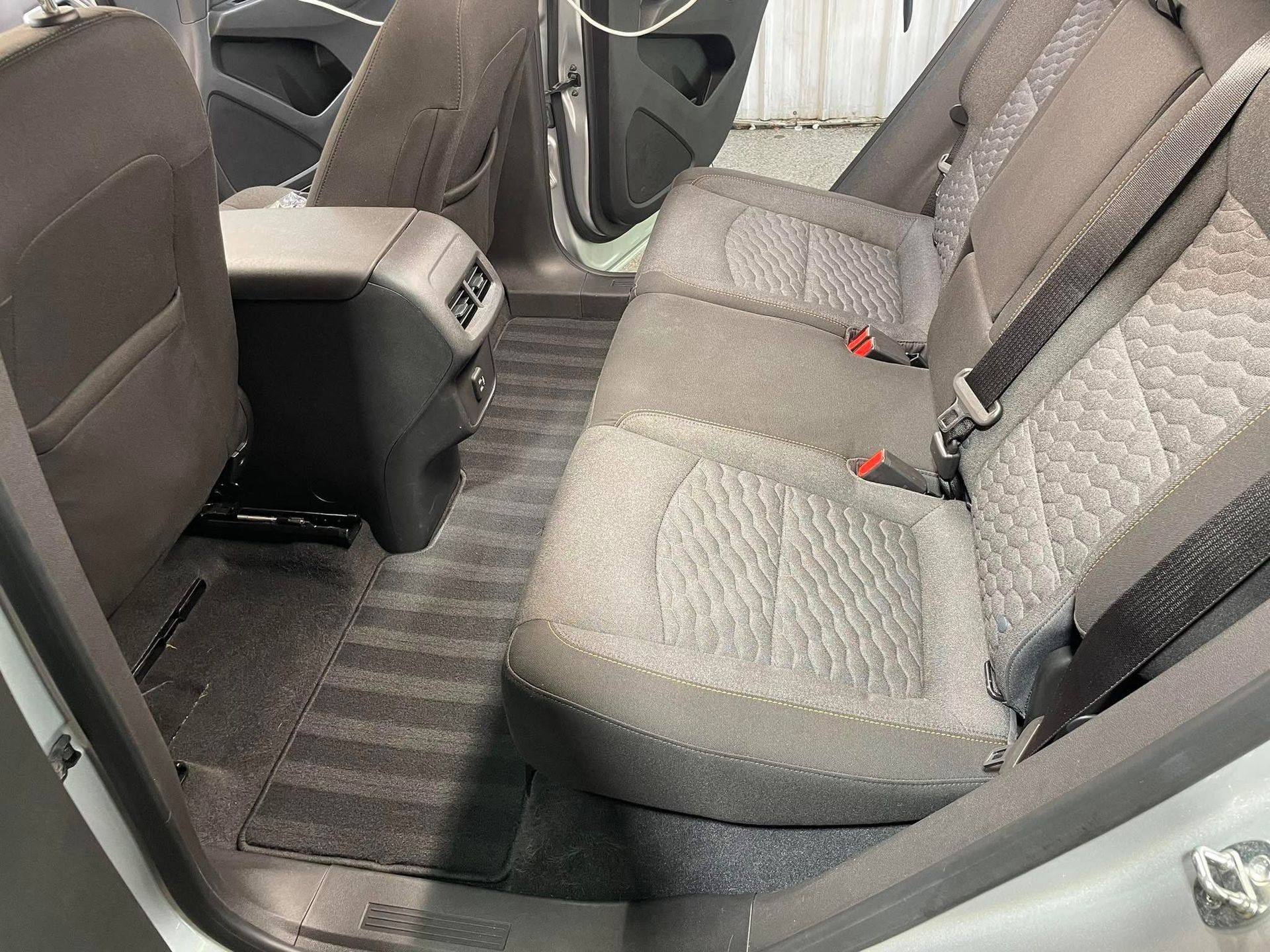 Car Interior With Grey Fabric Rear Bench Seats — Car Detailing Mobile Cleaning Co In Port Macquarie, NSW