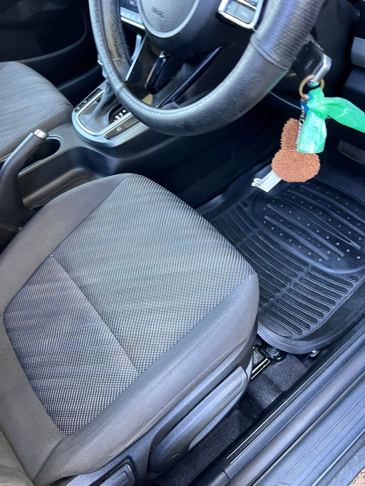 Car Interior With Steering Wheel, and a Dangling Keychain— Car Detailing Mobile Cleaning Co In Port Macquarie, NSW