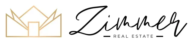 Zimmer Real Estate logo with gold crown house icon and black script text on white background
