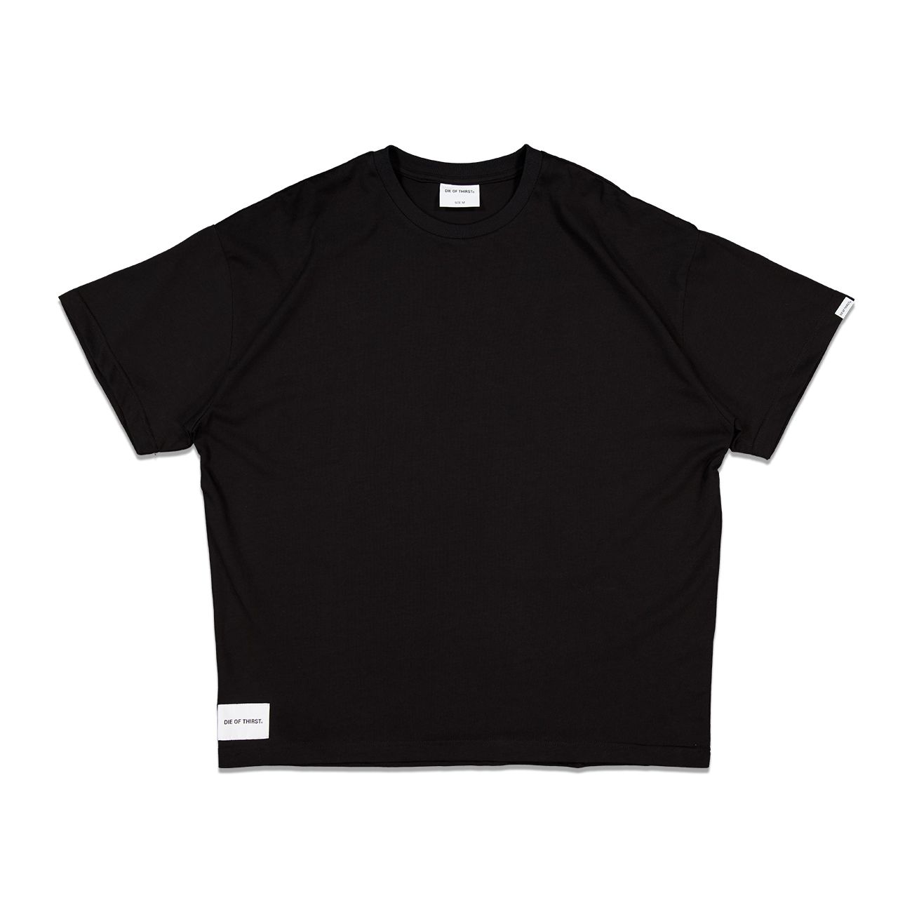 Black oversized t-shirt with a small tag on the bottom left and a label on the back neckline.