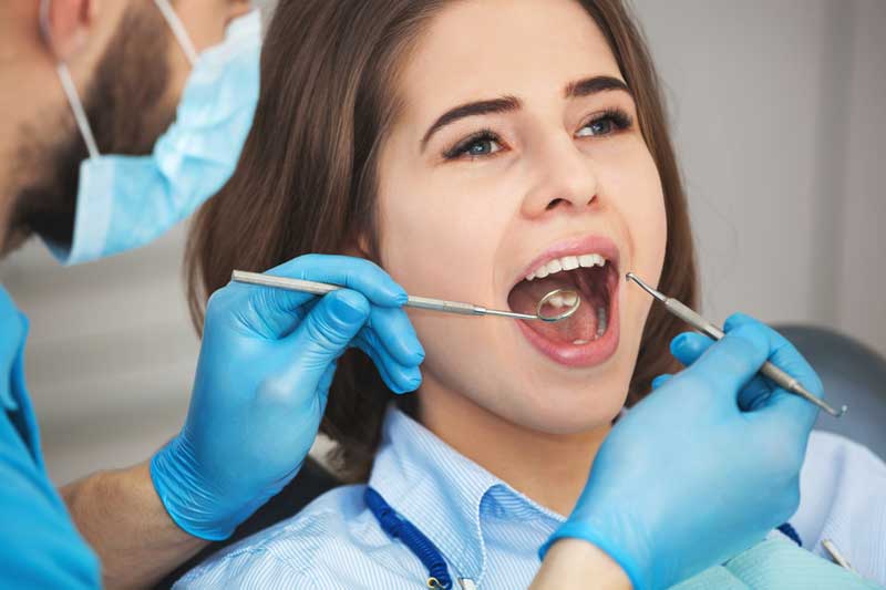 Woman Having Dental Check-up — Orange, CT — New England Dental Health Services PC Woman Having Dental Check-up — Orange, CT — New England Dental Health Services PC