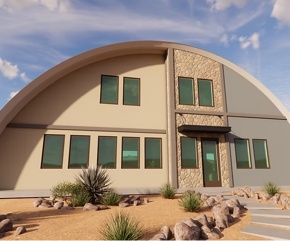 Modern desert building with curved roof, green windows, and stone entryway under a blue sky